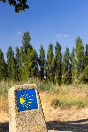 Concrete signpost marking the Camino de Santiago route near Muruzabal, Navarre, Spainの写真素材
