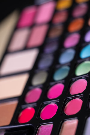 Makeup palette displaying a range of colorful lipstick, eyeshadows and blushの写真素材