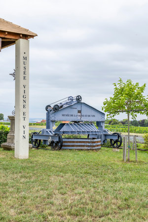 Historic grape press displaying winemaking tradition in Le Mesnil sur Oger, Franceの写真素材