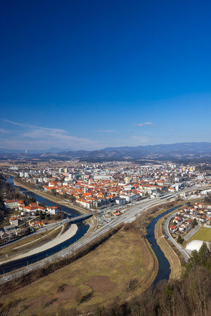 Celje city, Slovenia, viewed from above, featuring urban development and riverの写真素材