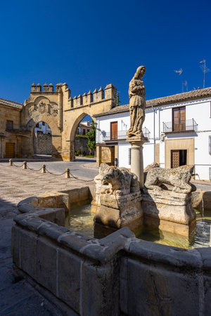 Fuente de los Leones and Puerta de Jaen adorning historic Plaza del Populoの写真素材