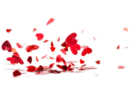 a lot of flying and falling hearts isolated on white background. Valentine's Day. symbol of love.の写真素材