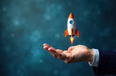 rocket launches from businessman's hand. concept for the successful launch of a new startup business project.の素材