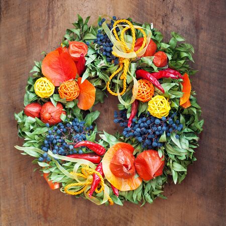 Autumn Wreath On A Wooden Backgroundの写真素材