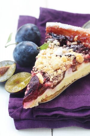 Piece Of Plum Cake On A Purple Napkinの写真素材