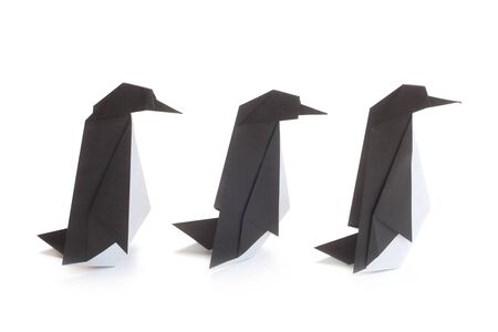 Three Origami Penguins Isolated On Whiteの写真素材