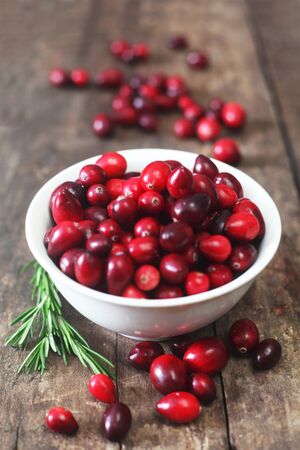 Fresh Cranberries On A Wooden Background