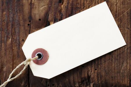 Blank Paper Label On A Wooden Backgroundの写真素材