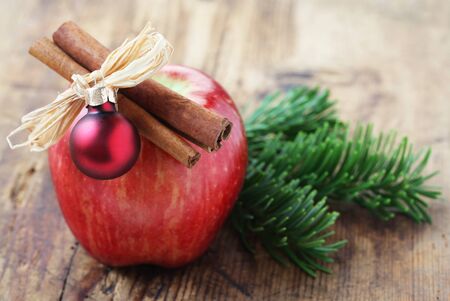 Red Apple With Christmas Decorationの写真素材