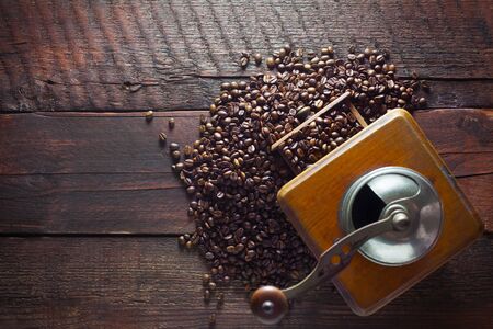 Top View Of A Coffee Mill On A Wooden Backgroundの写真素材