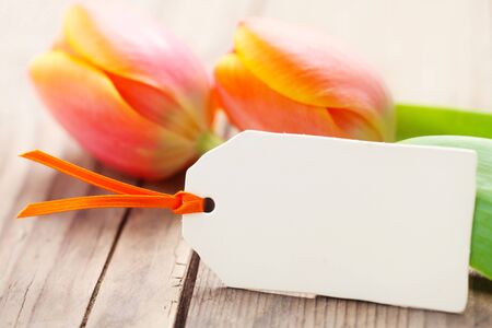 Blank Label With Orange Tulipsの写真素材