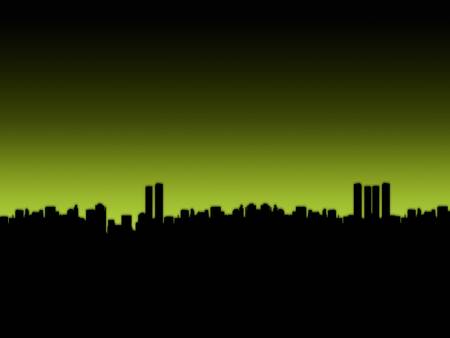 Silhouette of a large city skyline with green sky.の写真素材