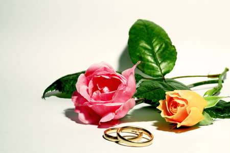 Wedding rings with rosesの写真素材