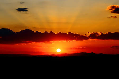 Beautiful landscape of the sun in a sunrise in the mountain
