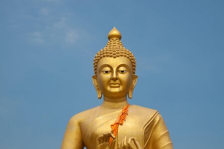 Golden buddha image in thai templeの写真素材