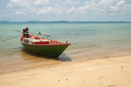 The green ship anchor at seaside of island in thailandの写真素材
