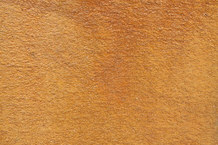 The maroon texture of the sand wall backgroundの写真素材