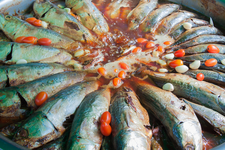 The thai local food mackerel fish boiled with salt and tomatoの写真素材
