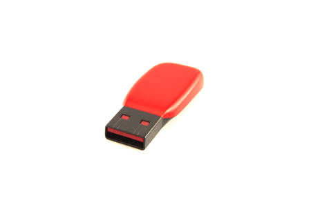 The red and black flash drive on white background