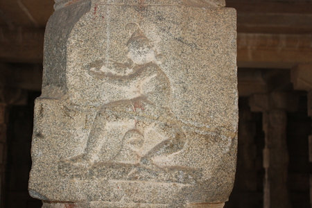 Hampi Vittala Temple Pillar Carving of Clown or Jester performanceの写真素材