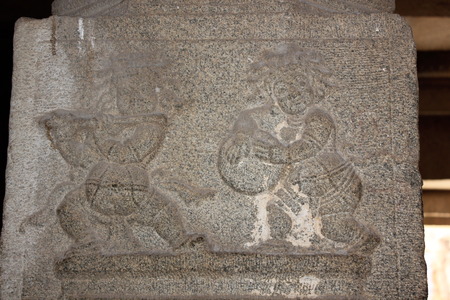 Hampi Vittala Temple Two male artist performing flute and drums pillar carvingの写真素材