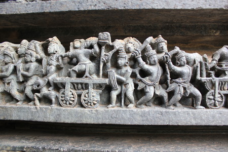 Hoysaleswara Temple wall carved with sculpture of warriorsの写真素材