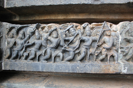 Hoysaleswara Temple wall carved with sculpture of warriorsの写真素材