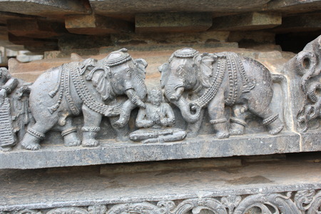 Carving of Prahlada being attacked by elephantsの写真素材