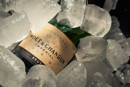 Bottle of champagne brand "Moet y Chandon" Extra Brut on ice.のeditorial素材