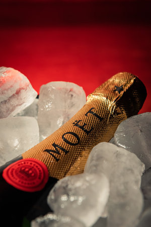 Bottle of champagne brand "Moet y Chandon" Extra Brut on ice.のeditorial素材