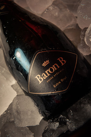 Bottle of "Baron B" brand champagne on ice.のeditorial素材