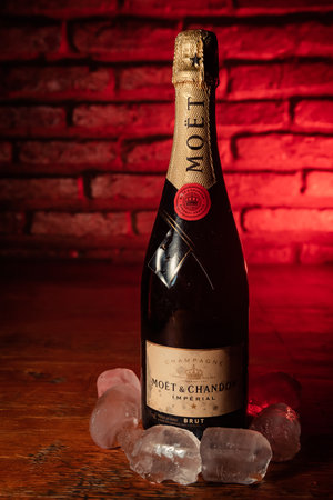 Bottle of champagne brand "Moet y Chandon" Extra Brut on ice.のeditorial素材