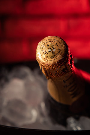 Bottle of champagne brand "Moet y Chandon" Extra Brut on ice.のeditorial素材