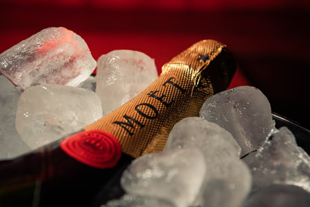 Bottle of champagne brand "Moet y Chandon" Extra Brut on ice.のeditorial素材