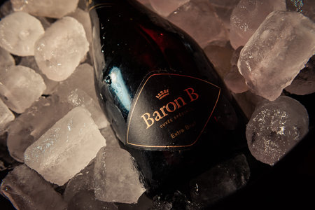 Bottle of "Baron B" brand champagne on ice.のeditorial素材