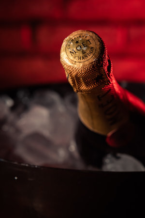Bottle of champagne brand "Moet y Chandon" Extra Brut on ice.のeditorial素材