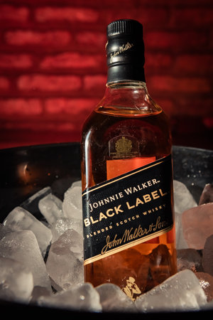 Bottle of Black Label brand whiskey on ice. johnnie walker.のeditorial素材