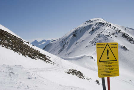 Danger panel in mountainの写真素材