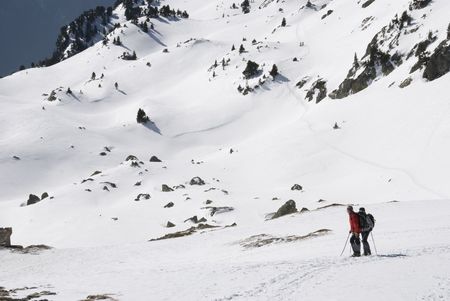Hikers in the snow mountain in winterの写真素材