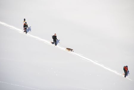 Hikers in the snow mountain in winterの写真素材