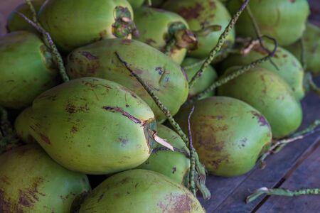 A pile of young coconut at the local flea market of northern Thailand for backgroundの写真素材
