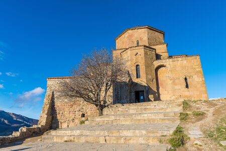 Jvari Monastery stands on the rocky mountaintop at the confluence of the Mtkvari and Aragvi rivers, overlooking the town of Mtskheta, which was formerly the capital of the Kingdom of Iberia.のeditorial素材