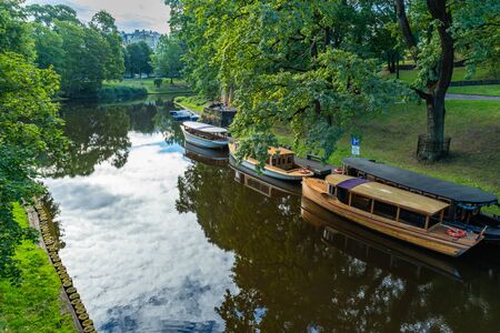 RIGA, LATVIA - July 6, 2018 : Sightseeing boats at Bastejkalna park in summerのeditorial素材