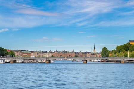 STOCKHOLM, SWEDEN - July 7, 2018 : Skeppsholmsbron bridge with Östermalm on the background seen from Skeppsbrokajen road on the opposite sideのeditorial素材