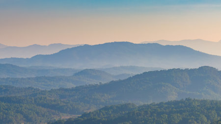 Beautiful misty and colorful morning scene of mountain range in northern part of Chiang Mai, Thailandの写真素材