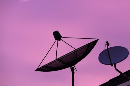 Silhouette Satellite on twilight ,backgroundの写真素材