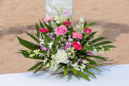 flower setting on the beach for wedding ceremonyの写真素材