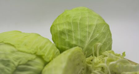 Cabbage cut on a white backgroundの写真素材