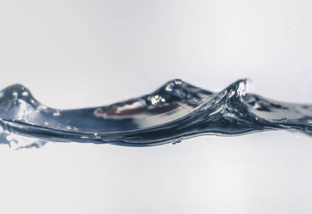 Nice abstract blue water splash on white background