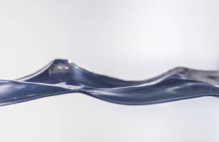 Nice abstract blue water splash on white backgroundの写真素材